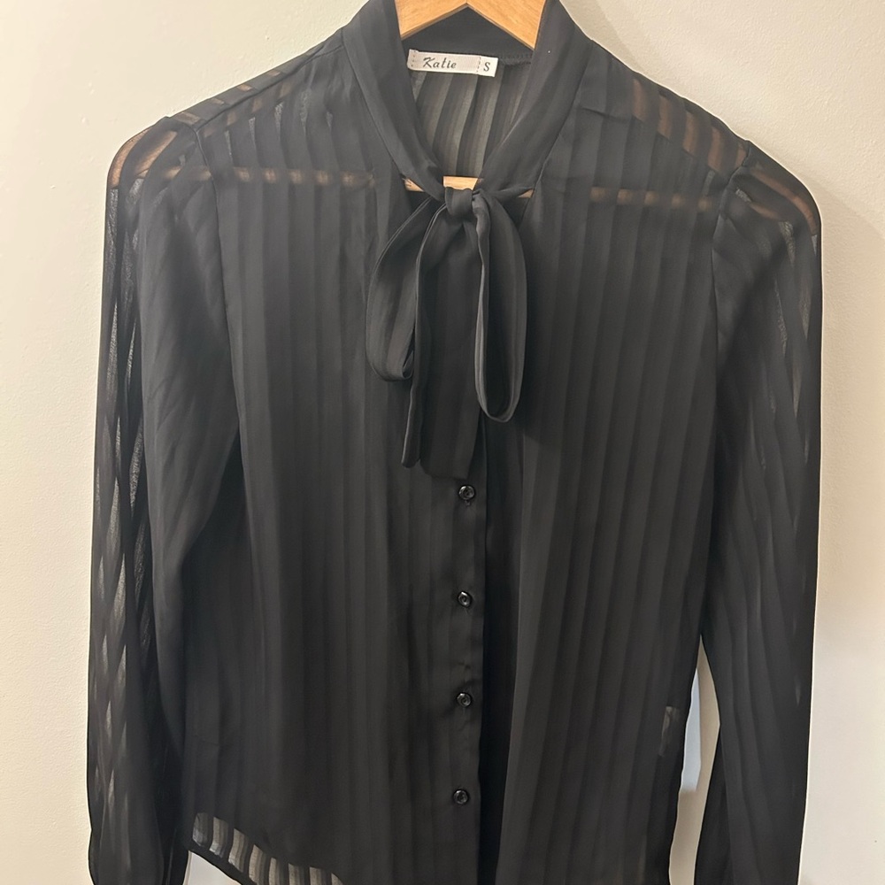 Black blouse for women.